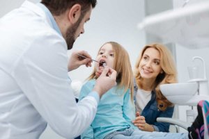 little girl is seen by orlando family dentist
