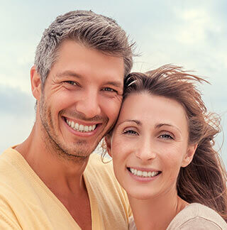 older couple have nice teeth a a result of cosmetic dentistry