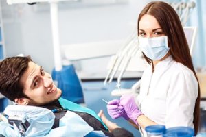 young female dentist practices today's dentistry