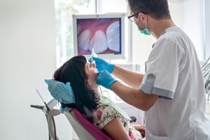 Patient undergoes her oral cancer screening